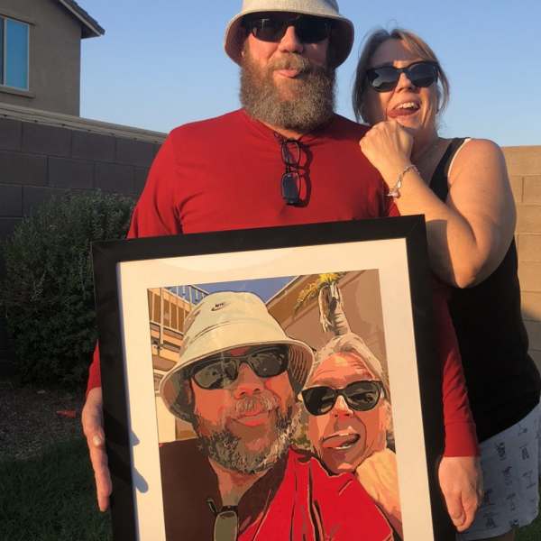 Photo of completed custom paint by numbers kit and couple